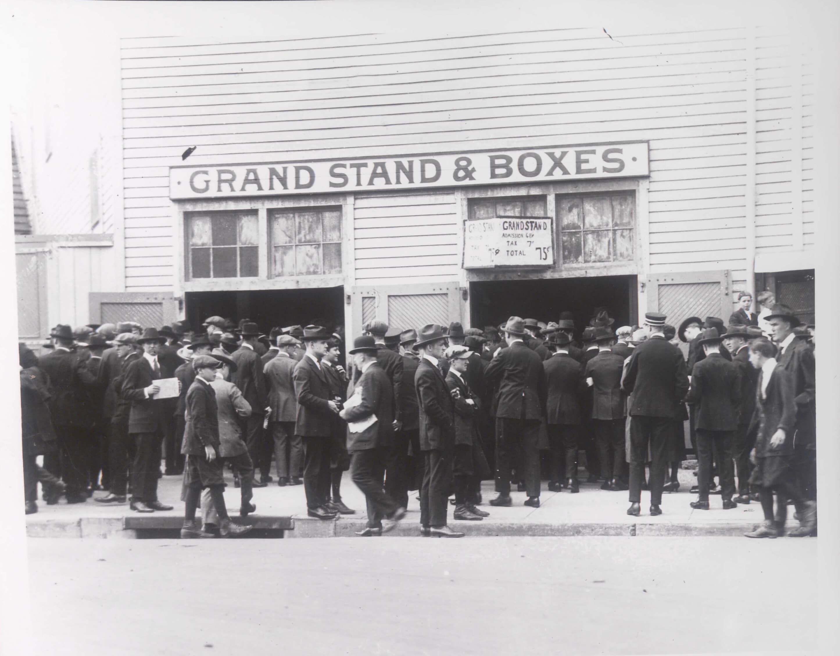 Crowd gathered outside the “Grand Stand & Boxes” entrance at Oriole Park ticket windows.