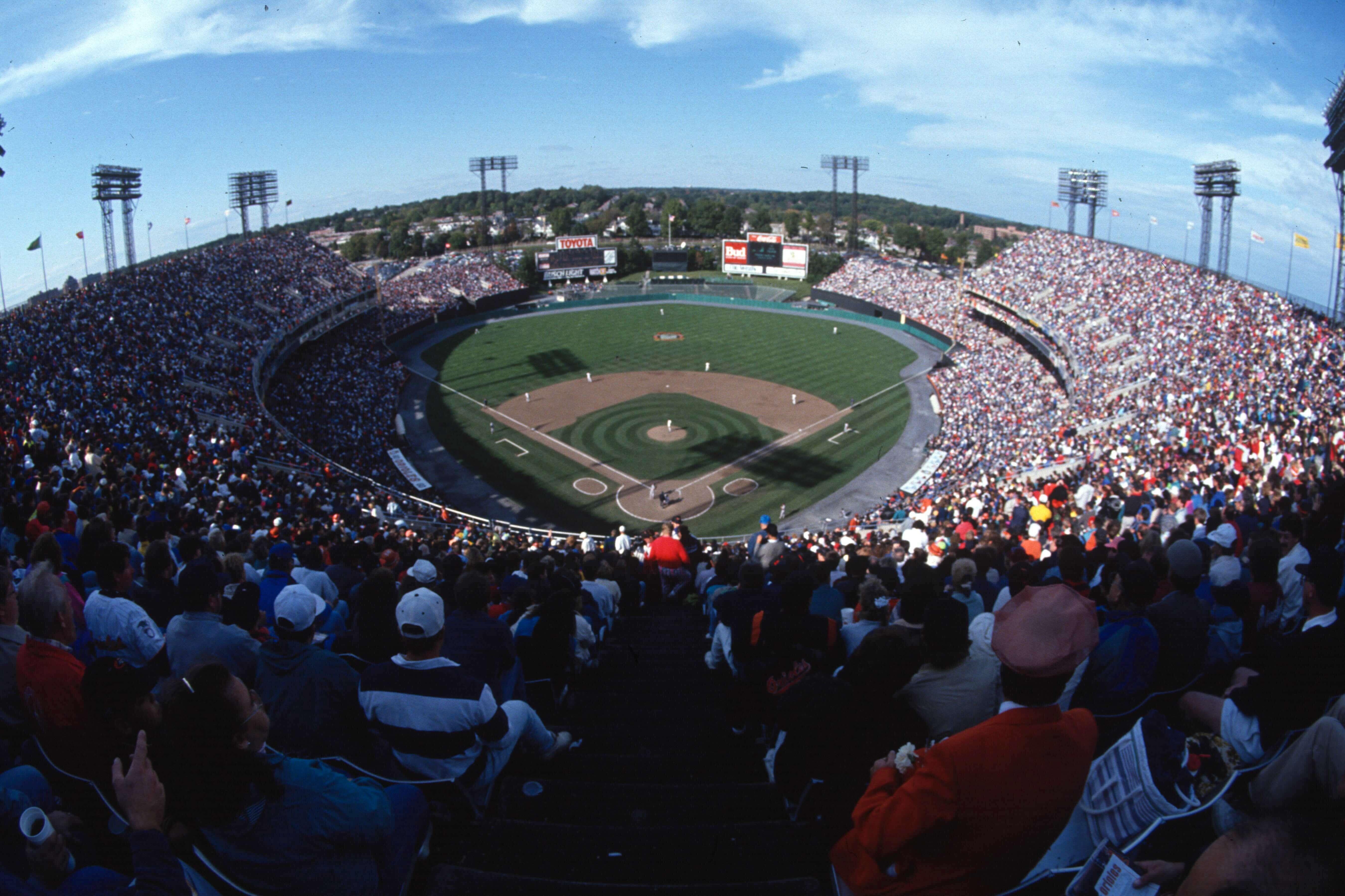 Wide panoramic view of a packed Memorial Stadium