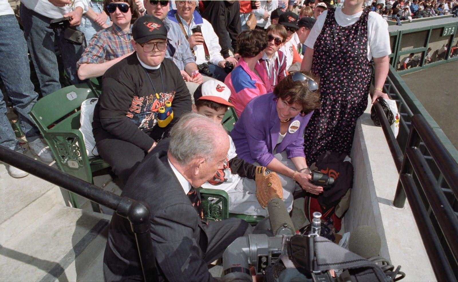 William Schaefer greets fans seated in the stands